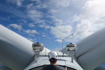 Technician in cell of wind turbine Technician in cell of wind turbine